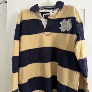 Notre Dame blue and gold stripped rugby shirt